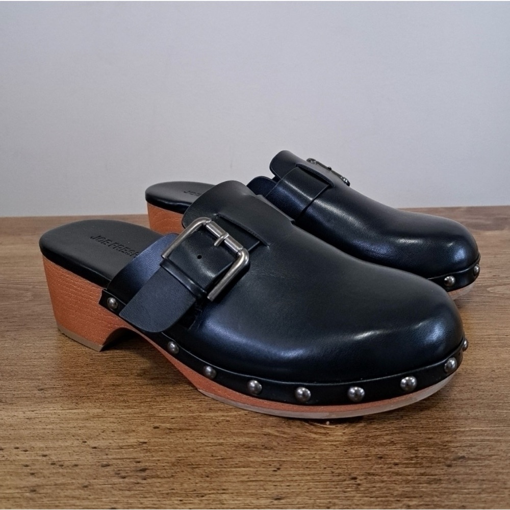 Black leather clogs with studded detail